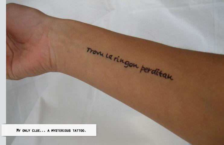 Image:My only clue...a mysterious tattoo.jpg